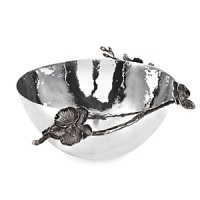By interpreting plant forms in cast metal, Michael Aram presents work which is evocative of a natural environment transformed and redefined. Says the designer, There is a velvety luxury–an almost gothic quality – to representing orchids in blackened nickel. To me, the pieces feel seductive and graceful, yet dark and unexpected. By interpreting plant forms in cast metal, Michael Aram presents work which is evocative of a natural environment transformed and redefined. Says the designer, There is a velvety luxury–an almost gothic quality – to representing orchids in blackened nickel. To me, the pieces feel seductive and graceful, yet dark and unexpected.
