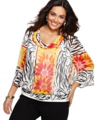 Add pop of tropical colors to your neutral bottoms with Alfani's three-quarter sleeve plus size top, finished by a cowl neckline and smocked hem. Add pop of tropical colors to your neutral bottoms with Alfani's three-quarter sleeve plus size top, finished by a cowl neckline and smocked hem.