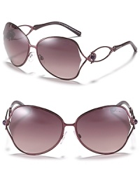Chic round oversized sunglasses with glamorous open temples and crystal bead embellishments. Chic round oversized sunglasses with glamorous open temples and crystal bead embellishments.