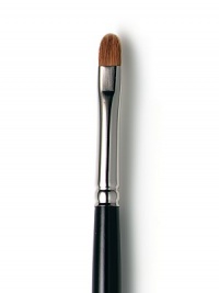 Comprised of natural hairs with tapered sides & a gently rounded tip that allows for exact placement of pigment in the outer corner of the eye. Great for adding definition & intensity to the corner of the eye. Gently pick up product with the sides of the brush and tap off excess product. Apply eye colour to the outer corner of the eye making a > from the eye crease to the lash line. Comprised of natural hairs with tapered sides & a gently rounded tip that allows for exact placement of pigment in the outer corner of the eye. Great for adding definition & intensity to the corner of the eye. Gently pick up product with the sides of the brush and tap off excess product. Apply eye colour to the outer corner of the eye making a > from the eye crease to the lash line.