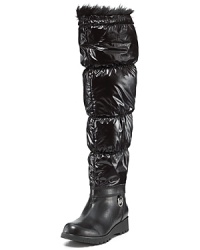 No snow bank stands a chance when faced with MICHAEL Michael Kors' endlessly tall cold weather boots. The mix of leather, nylon and faux fur has us wishing for blizzards. No snow bank stands a chance when faced with MICHAEL Michael Kors' endlessly tall cold weather boots. The mix of leather, nylon and faux fur has us wishing for blizzards.