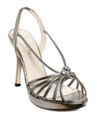 The Caparros Raquel Evening Sandals let you simply sparkle with their subtle rhinestone decor, slim straps and covered heel. The Caparros Raquel Evening Sandals let you simply sparkle with their subtle rhinestone decor, slim straps and covered heel.