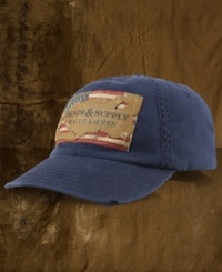 An homage to an American pastime, this baseball cap is rendered in distressed cotton twill with a ripped and repaired logo patch for a worn-in, old-school vibe. An homage to an American pastime, this baseball cap is rendered in distressed cotton twill with a ripped and repaired logo patch for a worn-in, old-school vibe.