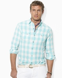 Crafted from soft cotton dobby in a bold plaid, a relaxed-fitting Western shirt embodies the look and feel of a vintage favorite. Crafted from soft cotton dobby in a bold plaid, a relaxed-fitting Western shirt embodies the look and feel of a vintage favorite.