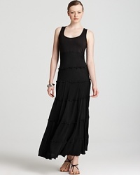 Slipped over a bikini or styled with glimmering accents, this Karen Kane maxi dress infuses your look with polished bohemia. Slipped over a bikini or styled with glimmering accents, this Karen Kane maxi dress infuses your look with polished bohemia.