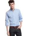 Roll up your sleeves, this breezy plaid shirt is a perfect way to dig deeper into a preppy style.