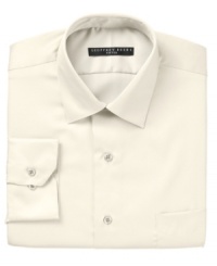 Crafted in convenient wrinkle wash fabric and expertly tailored for the modern man, this fitted Geoffrey Beene dress shirt jump-starts any guy's workweek wardrobe. Crafted in convenient wrinkle wash fabric and expertly tailored for the modern man, this fitted Geoffrey Beene dress shirt jump-starts any guy's workweek wardrobe.