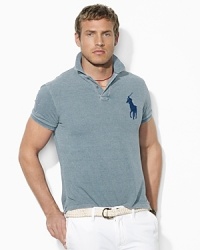 Rendered in a refreshing indigo hue for a masculine appeal, a short-sleeved cotton mesh polo is crafted for a trim, athletic fit with a tonal Big Pony at the chest. Rendered in a refreshing indigo hue for a masculine appeal, a short-sleeved cotton mesh polo is crafted for a trim, athletic fit with a tonal Big Pony at the chest.