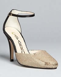 Strappy meets shine in these elegant and playful Caparros evening sandals, with thin ankle accents and boldly sequined toes. Strappy meets shine in these elegant and playful Caparros evening sandals, with thin ankle accents and boldly sequined toes.