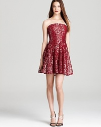 Delicate meets downtown with this metallic lace Aqua Luxe strapless dress-party-perfect for a fun evening on the town! Delicate meets downtown with this metallic lace Aqua Luxe strapless dress-party-perfect for a fun evening on the town!