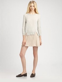 Light and soft in a luxurious heathery yarn from Italy, this effortless pullover gets added character from waist cutouts and subtle gathering.Ribbed roundneckLong sleeves with ribbed cuffsWide ribbed waist with front-to-back cutouts50% nylon/40% alpaca/10% mohairDry cleanImported of Italian fabricModel shown is 5'10 (177cm) wearing US size Small.This style runs small. We recommend ordering one size up for a standard fit. 