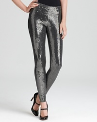 Put some shine in your step with these MICHAEL Michael Kors leggings shimmering with an abundant sequin finish. Polish of the pair with pumps and rock n' roll to the top of the fashion set. Put some shine in your step with these MICHAEL Michael Kors leggings shimmering with an abundant sequin finish. Polish of the pair with pumps and rock n' roll to the top of the fashion set.