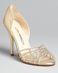 These evening shoes dazzle, with strap after strap of rhinestone after rhinestone starring against shimmering lamé in an intricate basketweave design; from Caparros. These evening shoes dazzle, with strap after strap of rhinestone after rhinestone starring against shimmering lamé in an intricate basketweave design; from Caparros.