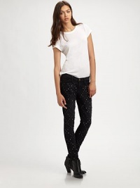 Channel rocker vibes in these studded, dark-wash skinnies. THE FITMedium rise, about 8Inseam, about 30THE DETAILSZip flyFive-pocket style98% cotton/2% elastaneMachine washMade in USA of imported fabricModel shown is 5'11 (178cm) wearing US size 4. Channel rocker vibes in these studded, dark-wash skinnies. THE FITMedium rise, about 8Inseam, about 30THE DETAILSZip flyFive-pocket style98% cotton/2% elastaneMachine washMade in USA of imported fabricModel shown is 5'11 (178cm) wearing US size 4.