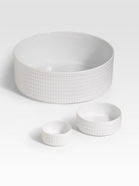 An elegantly detailed serving bowl is made entirely by hand in fine Limoges porcelain with a raised pearl detail. From the Perlee White Collection Porcelain 4½H X 12 diam. Dishwasher safe Imported An elegantly detailed serving bowl is made entirely by hand in fine Limoges porcelain with a raised pearl detail. From the Perlee White Collection Porcelain 4½H X 12 diam. Dishwasher safe Imported