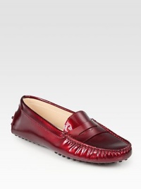 Timeless Gommini staple handcrafted in Italy of stamped patent leather for an airbrushed effect. Patent leather upperLeather liningRubber solePadded insoleMade in Italy Timeless Gommini staple handcrafted in Italy of stamped patent leather for an airbrushed effect. Patent leather upperLeather liningRubber solePadded insoleMade in Italy