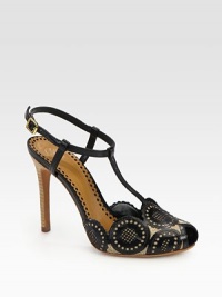 Intricate cutouts define this leather t-strap pump, paired with natural burlap for textural appeal. Stacked heel, 4 (100mm)Leather and burlap upperPeep toeAdjustable ankle strapLeather lining and solePadded insoleImported Intricate cutouts define this leather t-strap pump, paired with natural burlap for textural appeal. Stacked heel, 4 (100mm)Leather and burlap upperPeep toeAdjustable ankle strapLeather lining and solePadded insoleImported
