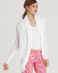 A summer style essential, this Lilly Pulitzer wrap lends a lightweight layer to all your casual essentials. Team with printed pants for daytime styling or slip it over a bikini for seaside escapes. A summer style essential, this Lilly Pulitzer wrap lends a lightweight layer to all your casual essentials. Team with printed pants for daytime styling or slip it over a bikini for seaside escapes.