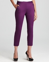 Pack a major sartorial punch in these DKNY pants, flaunting a tempura-bright tone and bullish zip pockets for a bright, bold approach to everyday dressing. Pack a major sartorial punch in these DKNY pants, flaunting a tempura-bright tone and bullish zip pockets for a bright, bold approach to everyday dressing.