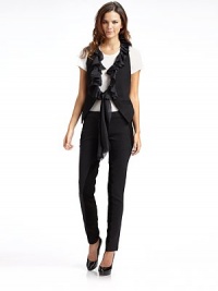 THE LOOKV neckline Hook-and-eye front Sleeveless Single welt pocket Removable silk ruffle trimTHE FITAbout 37 from shoulder to hem at longest pointTHE MATERIAL56% rayon/38% nylon/6% polyurethane Trim: silkCARE & ORIGINDry clean Imported THE LOOKV neckline Hook-and-eye front Sleeveless Single welt pocket Removable silk ruffle trimTHE FITAbout 37 from shoulder to hem at longest pointTHE MATERIAL56% rayon/38% nylon/6% polyurethane Trim: silkCARE & ORIGINDry clean Imported