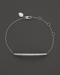 Diamonds sparkle in a slim 14K. white gold bar. By Meira T. Diamonds sparkle in a slim 14K. white gold bar. By Meira T.