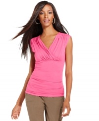Chic and simple, INC's fitted surplice top makes a great option for pairing with summer skirts, shorts and more! Chic and simple, INC's fitted surplice top makes a great option for pairing with summer skirts, shorts and more!