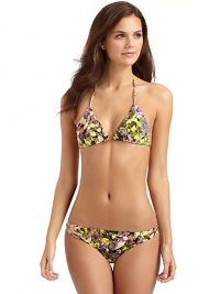 THE LOOKMulticolored tulip graphic printAdjustable halter strapsAdjustable triangle cups with ruffled detailElastic waist and leg openingsMetal logo detail on frontTHE MATERIAL72% nylon/28% elastaneFully linedCARE & ORIGINMachine washMade in Italy THE LOOKMulticolored tulip graphic printAdjustable halter strapsAdjustable triangle cups with ruffled detailElastic waist and leg openingsMetal logo detail on frontTHE MATERIAL72% nylon/28% elastaneFully linedCARE & ORIGINMachine washMade in Italy
