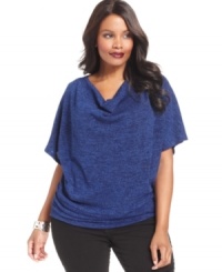 A draped neckline lends an elegant finish to NY Collection's short sleeve plus size sweater. A draped neckline lends an elegant finish to NY Collection's short sleeve plus size sweater.