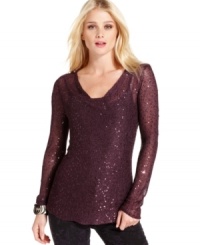 Sparkle on in this Calvin Klein Jeans sweater, featuring allover tonal sequins on mesh knit. Sparkle on in this Calvin Klein Jeans sweater, featuring allover tonal sequins on mesh knit.