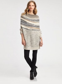 Patterned, wool-blend sweater tunic awakened by a unique cape collar in a timeless fair isle pattern. Oversized cape collarLong dolman sleevesRibbed cuffs and hemAbout 34 from shoulder to hem50% acrylic/25% alpaca/25% woolDry cleanImported of Italian fabricModel shown is 5'9 (176cm) wearing US size Small. Patterned, wool-blend sweater tunic awakened by a unique cape collar in a timeless fair isle pattern. Oversized cape collarLong dolman sleevesRibbed cuffs and hemAbout 34 from shoulder to hem50% acrylic/25% alpaca/25% woolDry cleanImported of Italian fabricModel shown is 5'9 (176cm) wearing US size Small.