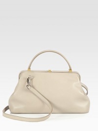 Luxurious leather in an elegant framed style.Top handle, 3½ dropDetachable shoulder strap, 21 dropTop clasp closureProtective metal feetOne inside zip pocketTwo inside open pocketsCanvas lining13W X 7¼H X 3¼DMade in USA Luxurious leather in an elegant framed style.Top handle, 3½ dropDetachable shoulder strap, 21 dropTop clasp closureProtective metal feetOne inside zip pocketTwo inside open pocketsCanvas lining13W X 7¼H X 3¼DMade in USA