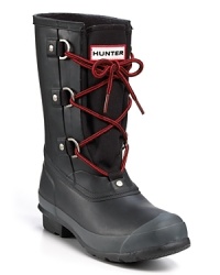 Rugged laces bind winter-perfect canvas and rubber on Hunter's bold, cold-weather boots. Rugged laces bind winter-perfect canvas and rubber on Hunter's bold, cold-weather boots.