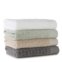 Inspired from the architectural shape of classic bath tiles and made of 100% combed Turkish cotton, the Sculpt Tile towel is the perfect decorative compliment to any bath. Inspired from the architectural shape of classic bath tiles and made of 100% combed Turkish cotton, the Sculpt Tile towel is the perfect decorative compliment to any bath.