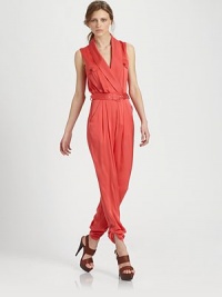 This vintage-inspired one-piece design of liquid silky-smooth fabric drapes over the body in a dramatic hue. Shawl collarSleevelessChest flap pocketsElasticized waist with button closure and adjustable beltDual wide slash pocketsPleating for added drapeButton-tab hemInseam, about 27Rise, about 1292% silk/8% spandexDry cleanImportedModel shown is 5'9½ (176cm) wearing US size 4. This vintage-inspired one-piece design of liquid silky-smooth fabric drapes over the body in a dramatic hue. Shawl collarSleevelessChest flap pocketsElasticized waist with button closure and adjustable beltDual wide slash pocketsPleating for added drapeButton-tab hemInseam, about 27Rise, about 1292% silk/8% spandexDry cleanImportedModel shown is 5'9½ (176cm) wearing US size 4.