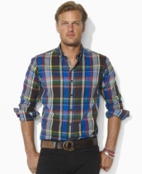Rustic meets refined in this trim-fitting sport shirt, rendered in soft plaid cotton with Ralph Lauren's iconic pony accenting the left chest. Rustic meets refined in this trim-fitting sport shirt, rendered in soft plaid cotton with Ralph Lauren's iconic pony accenting the left chest.