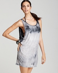 Fall for the understated cool of this breezy cover up from Magicsuit. With it's loose fit and directional dye job, this featherweight coverup flatters every figure. Fall for the understated cool of this breezy cover up from Magicsuit. With it's loose fit and directional dye job, this featherweight coverup flatters every figure.