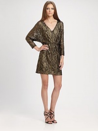 Luxe metallic lace, tailored with a gathered waist and sculptural dolman sleeves.V necklineThree-quarter dolman sleevesGathered waistSilk liningAbout 22 from natural waist50% nylon/48% polyester/2% spandexDry cleanImportedModel shown is 5'10 (177cm) wearing US size 4. Luxe metallic lace, tailored with a gathered waist and sculptural dolman sleeves.V necklineThree-quarter dolman sleevesGathered waistSilk liningAbout 22 from natural waist50% nylon/48% polyester/2% spandexDry cleanImportedModel shown is 5'10 (177cm) wearing US size 4.