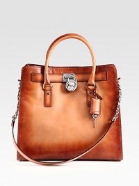 Unique faded leather in an elegant design accented with sleek hardware.Double top handles, 5 dropChain and leather shoulder strap, 12 dropMagnetic snap closureProtective metal feetOne inside zip pocketFour inside open pocketsFully lined14½W X 11½H X 6½DImported Unique faded leather in an elegant design accented with sleek hardware.Double top handles, 5 dropChain and leather shoulder strap, 12 dropMagnetic snap closureProtective metal feetOne inside zip pocketFour inside open pocketsFully lined14½W X 11½H X 6½DImported