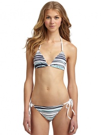 THE LOOKTwo-tone brushstroke wave patternAdjustable halter straps with O-ringsAdjustable triangle cupsBack tie closureTHE MATERIAL80% nylon/20% spandexCARE & ORIGINHand washMade in USA of imported fabricPlease note: Bikini bottom sold separately. THE LOOKTwo-tone brushstroke wave patternAdjustable halter straps with O-ringsAdjustable triangle cupsBack tie closureTHE MATERIAL80% nylon/20% spandexCARE & ORIGINHand washMade in USA of imported fabricPlease note: Bikini bottom sold separately.