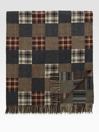Preppy checks and tartan accents elevate this sophisticated throw crafted from fine Italian wool.Fringed ends55 x 67WoolDry cleanMade in Italy Preppy checks and tartan accents elevate this sophisticated throw crafted from fine Italian wool.Fringed ends55 x 67WoolDry cleanMade in Italy