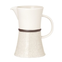 A bold band encircles this stately pitcher, separating the plain top from the crackle-finish bottom. And it's a design that separates this pitcher from all the rest A bold band encircles this stately pitcher, separating the plain top from the crackle-finish bottom. And it's a design that separates this pitcher from all the rest