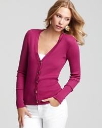 Crisp cotton composes this classic cardigan by Tory Burch, styled slim and ready to layer. Crisp cotton composes this classic cardigan by Tory Burch, styled slim and ready to layer.
