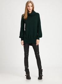 Masterful example of effortless elegance, this lengthy turtleneck of pure cashmere has long bishop sleeves and a split hem. TurtleneckLong bishop sleevesSplit hem hits below the hipsCashmereDry cleanImportedModel shown is 5'10 (177cm) wearing US size Small. Additional Information Women's Premier Designer & Contemporary Size Guide Masterful example of effortless elegance, this lengthy turtleneck of pure cashmere has long bishop sleeves and a split hem. TurtleneckLong bishop sleevesSplit hem hits below the hipsCashmereDry cleanImportedModel shown is 5'10 (177cm) wearing US size Small. Additional Information Women's Premier Designer & Contemporary Size Guide