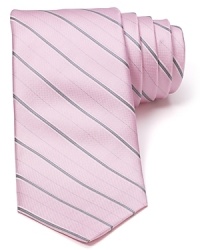 An immaculate silk tie with a classic pinstripe pattern from Michael Kors brings a bit of panache to your office attire. An immaculate silk tie with a classic pinstripe pattern from Michael Kors brings a bit of panache to your office attire.