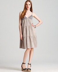 A charming AIKO sundress flaunts mixed prints and a tiered bodice, channeling your inner bohemian and reflecting your laidback sense of style. A charming AIKO sundress flaunts mixed prints and a tiered bodice, channeling your inner bohemian and reflecting your laidback sense of style.
