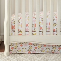 Bright blossoms in pink, peach and coral with green and grey leaves on a white background.The American Academy of Pediatrics and the U.S. Consumer Product Safety Commission have made recommendations for safe bedding practices for babies. When putting infants under 12 months to sleep, remove pillows, quilts, comforters, and other soft items from the crib. Bright blossoms in pink, peach and coral with green and grey leaves on a white background.The American Academy of Pediatrics and the U.S. Consumer Product Safety Commission have made recommendations for safe bedding practices for babies. When putting infants under 12 months to sleep, remove pillows, quilts, comforters, and other soft items from the crib.