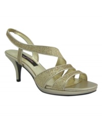 All that glitters! With their sparkly eye-catching straps, the Nolga evening sandals by Nina will keep you shining brightly. A platform sole and low heel make them comfortable enough to dance in all night long. All that glitters! With their sparkly eye-catching straps, the Nolga evening sandals by Nina will keep you shining brightly. A platform sole and low heel make them comfortable enough to dance in all night long.