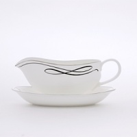 Waterford's Ballet Ribbon bone china dinnerware echoes the graceful forms and lines of the interpretive dance and the satin ribbons which adorn ballerinas' costumes and pointe shoes. Mix in the brightly colored accent plates to make your table pop or to blend the pattern into your dining décor. Waterford's Ballet Ribbon bone china dinnerware echoes the graceful forms and lines of the interpretive dance and the satin ribbons which adorn ballerinas' costumes and pointe shoes. Mix in the brightly colored accent plates to make your table pop or to blend the pattern into your dining décor.