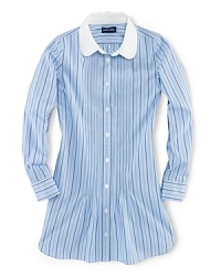 The classic shirtdress is rendered in lightweight cotton poplin and updated with a pretty stripe and pintuck detailing. The classic shirtdress is rendered in lightweight cotton poplin and updated with a pretty stripe and pintuck detailing.
