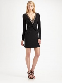 A flattering twist front detail and a shimmering, sequined inset define this utterly wearable jersey style.Sequined V necklineLong sleevesTwist-front detailConcealed back zipFully linedAbout 18 from natural waist92% polyester/8% spandexDry cleanImportedModel shown is 5'11 (180cm) wearing US size Small. A flattering twist front detail and a shimmering, sequined inset define this utterly wearable jersey style.Sequined V necklineLong sleevesTwist-front detailConcealed back zipFully linedAbout 18 from natural waist92% polyester/8% spandexDry cleanImportedModel shown is 5'11 (180cm) wearing US size Small.